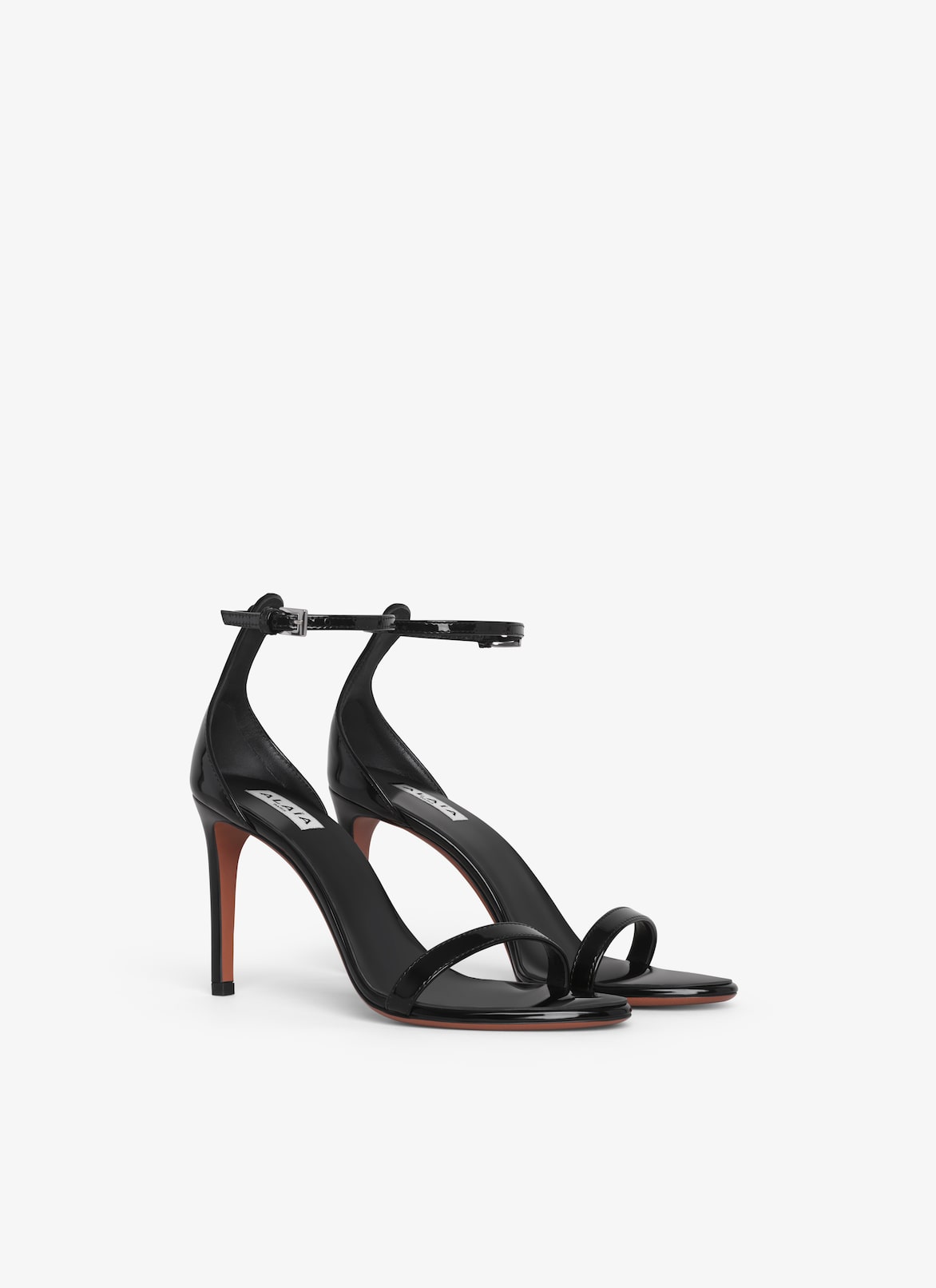 LA SANDALE HIGH SANDALS ALAÏA LA SANDALE HIGH SANDALS NOIR
